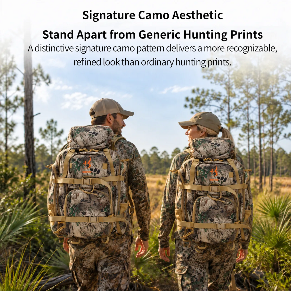 Two people in camouflage hunting apparel and large camo backpacks standing in a sunlit forest clearing, with text at the top reading 'Signature Camo Aesthetic' and 'Stand Apart from Generic Hunting Prints.'.