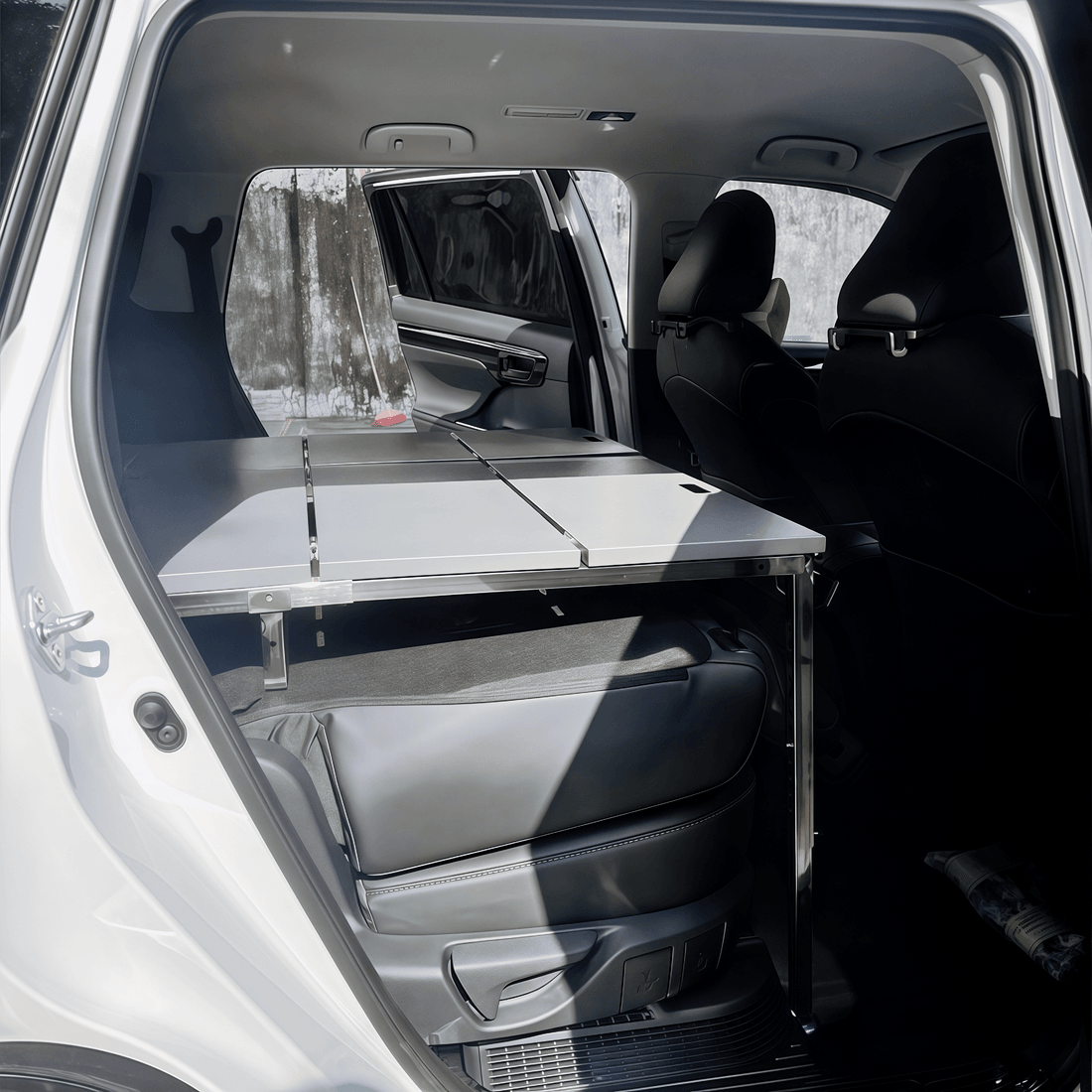 Modular SUV sleeping platform panel sections showing durable aluminum alloy construction