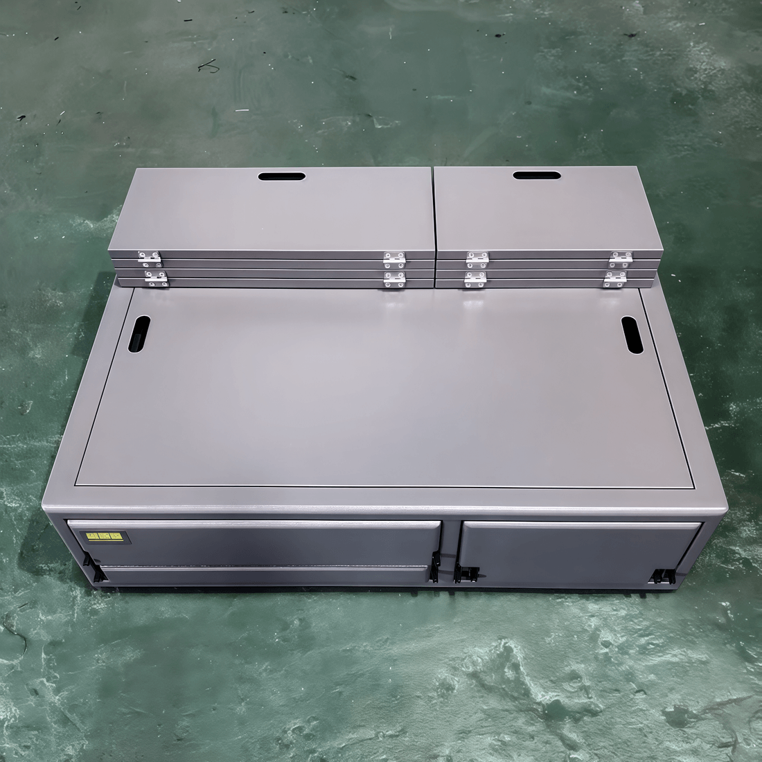 Overland drawer system assembly showing aluminum frame and flat platform deck
