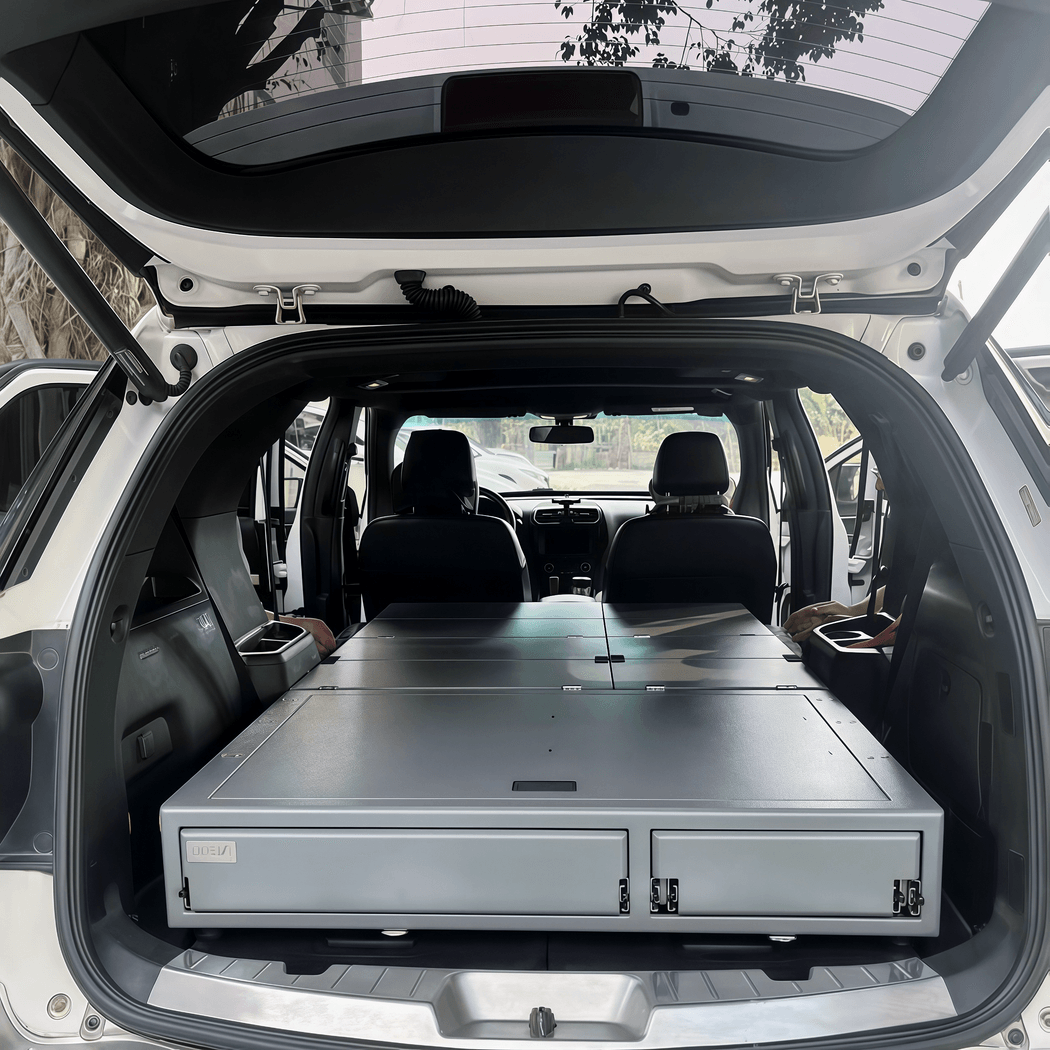Modular SUV sleeping platform installed in cargo area creating a perfectly flat bed space for car camping