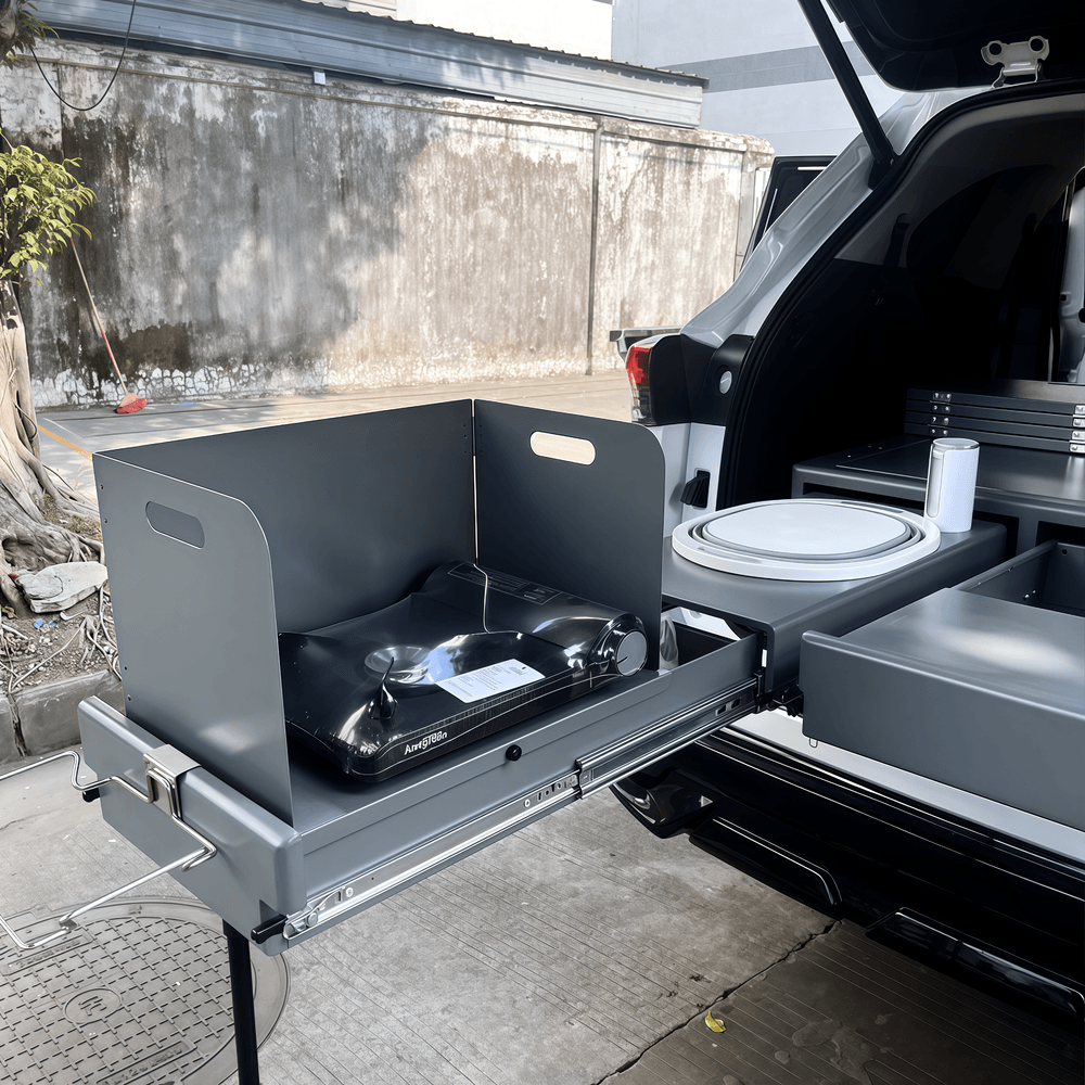 SUV sleeping platform kit featuring integrated slide-out kitchen and storage